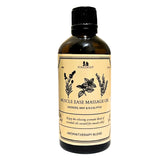 Bottle of Pinecrest Muscle Ease Massage Oil on a white background